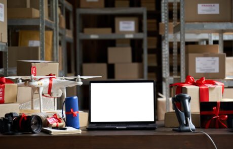 Table with electronic devices and laptop mock up on table. Cyber monday sale